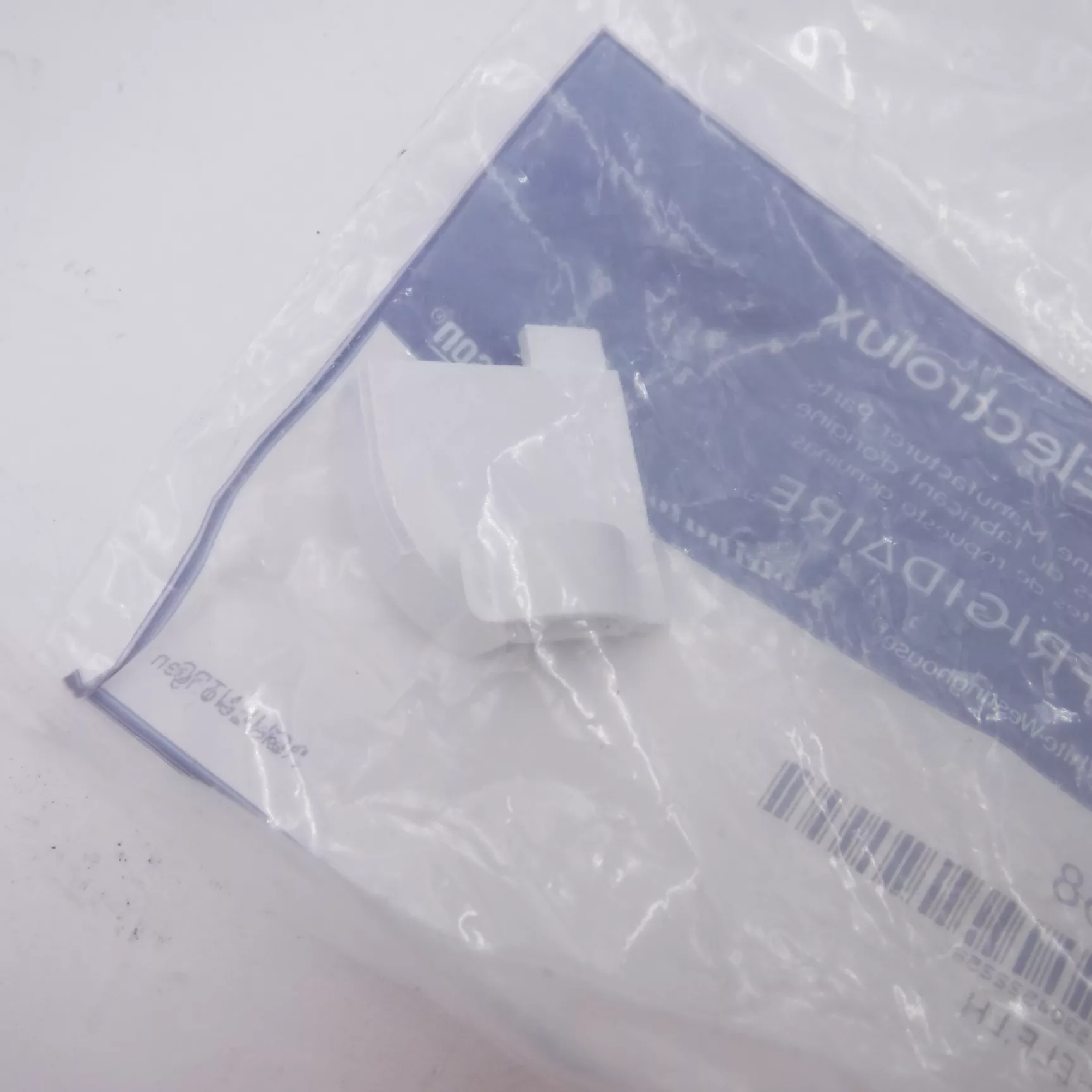 Genuine OEM Frigidaire White LH Freezer Clip 5304522258